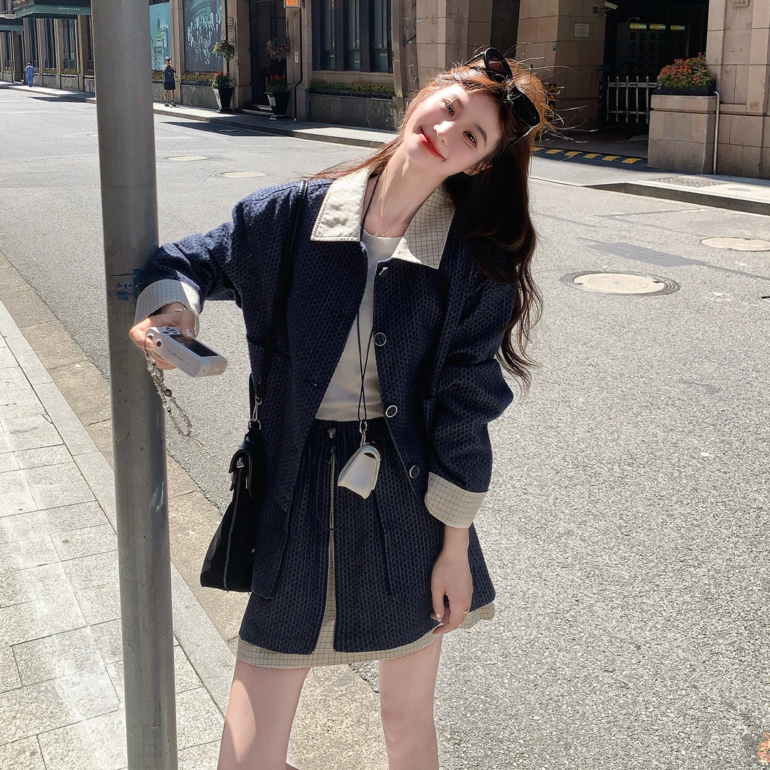 深蓝色秋季套装女2025新款减龄穿搭一整套拼接设计感半身裙两件套