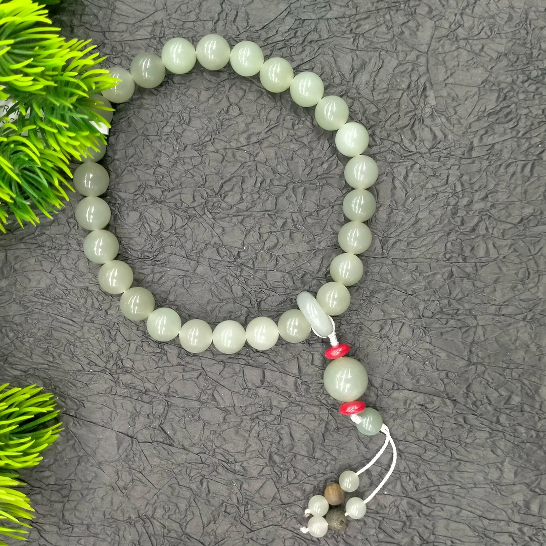 新疆和田玉且末料青白玉卡10手持 26颗