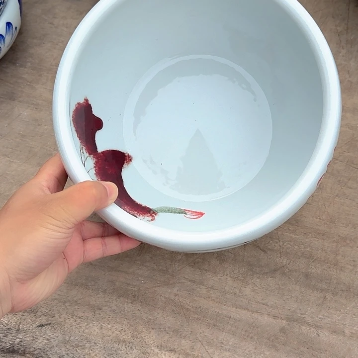 瓷片直径23厘米，高度13厘米..