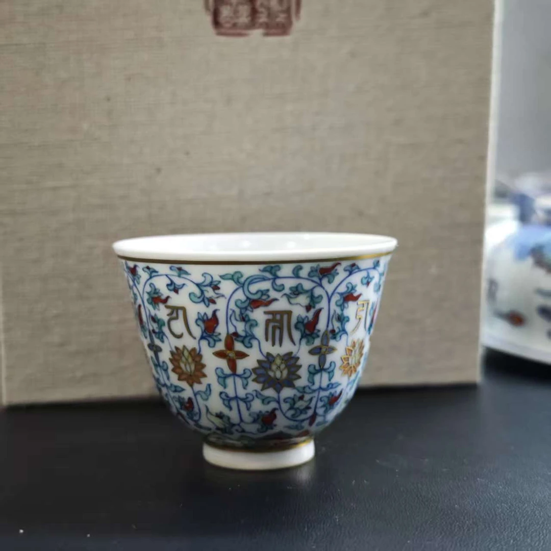 T49涂杏花描金莲拖梵文杯