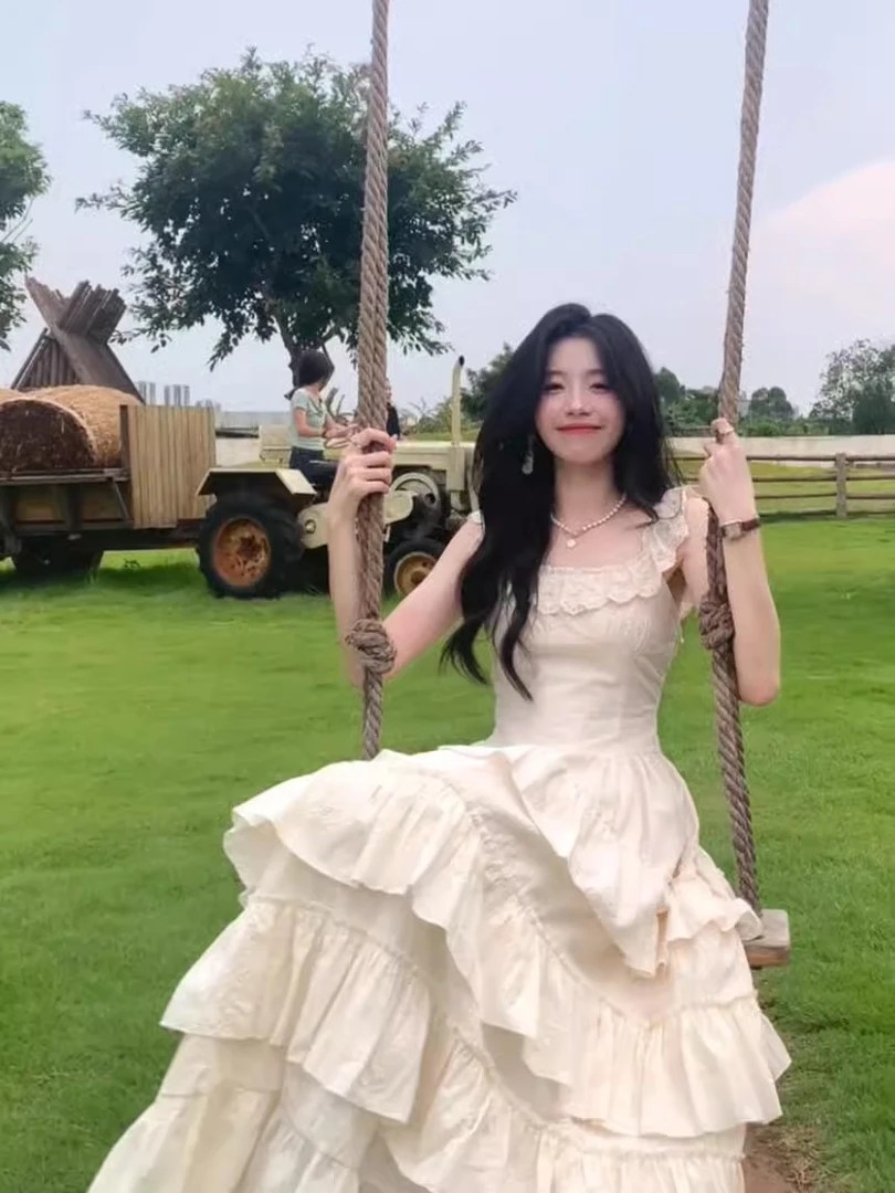 小飞袖吊带连衣裙女蕾丝拼接大裙摆收腰海边度假超仙中长款蛋糕裙