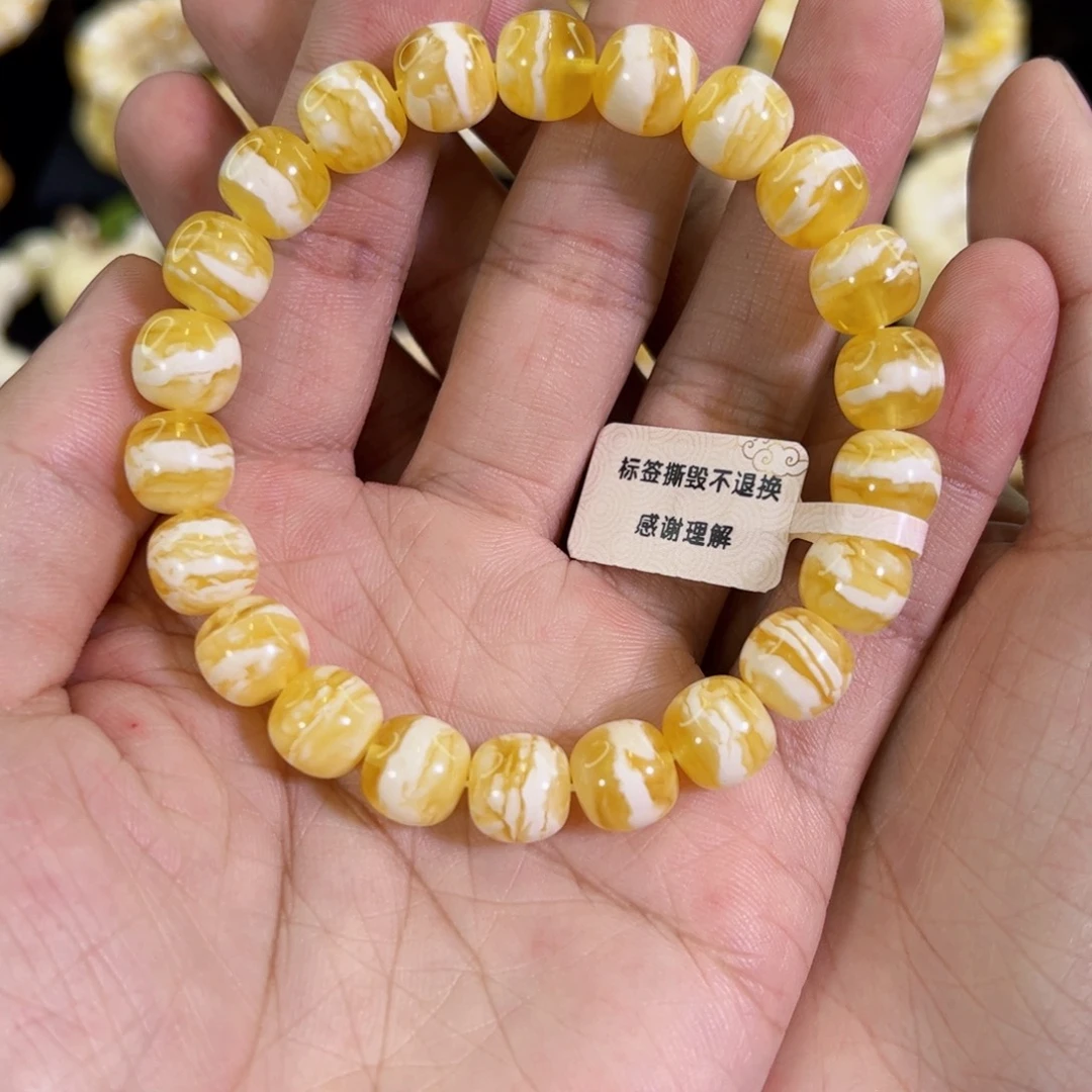 琥珀未镶嵌裸石同料金瓷白虎皮纹老型手串