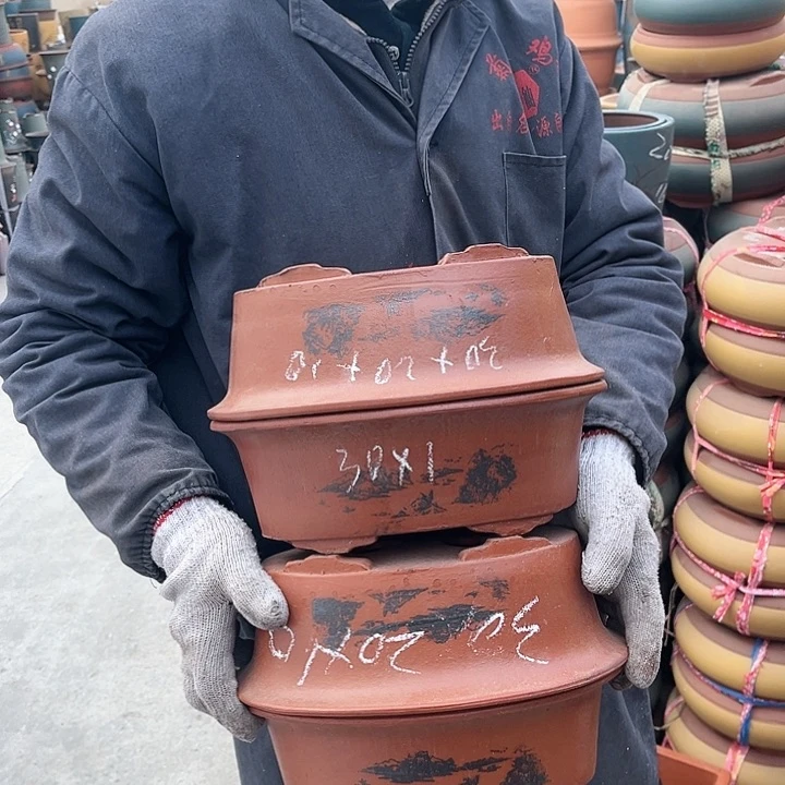 紫砂紫砂花盆和红陶茶具等等