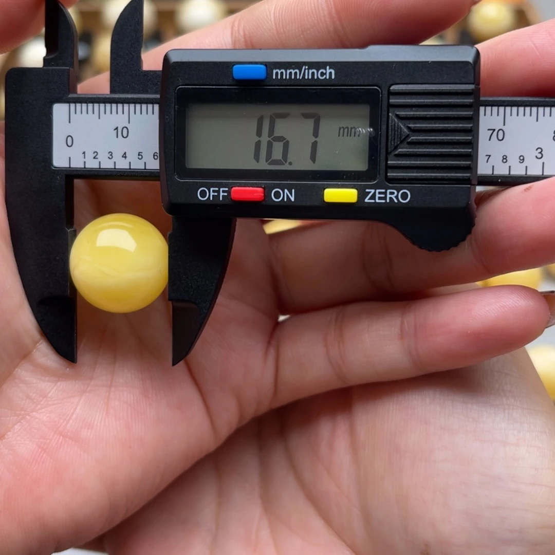 琥珀未镶嵌裸石蜜蜡圆珠笑