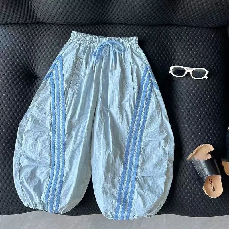 儿童休闲弯刀裤2025夏季男女童老爹裤速干伞兵裤气球裤拉条百搭