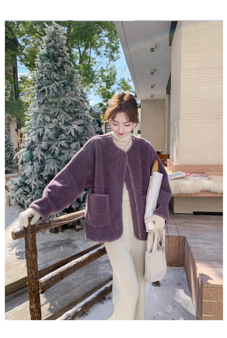 紫色时尚气质设计感皮毛一体外套女2025冬季新款韩系休闲圆领上衣