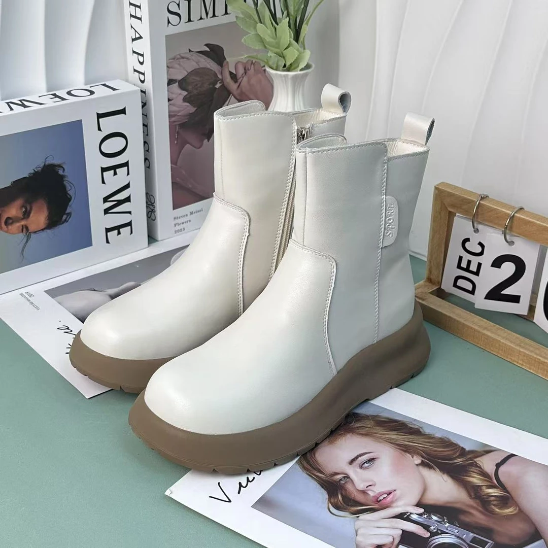 2025冬季厚底雪地靴女中老年妈妈鞋防滑保暖羊毛真皮短棉靴171-1