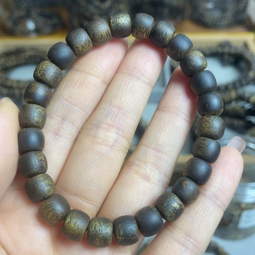 沉香碎屑沉香棋楠沉香老型古珠8mm花香韵沉水浮