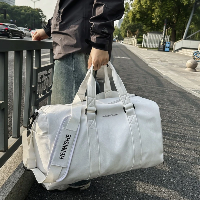 男士手提旅行包PU皮质防泼水斜挎运动健身包男短途出差旅游行李包