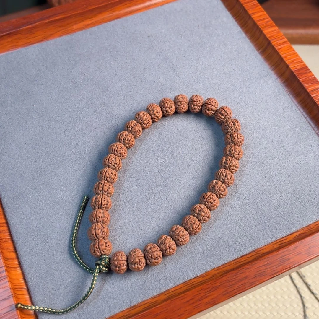 H***.金刚菩提吊坠凹底梅花