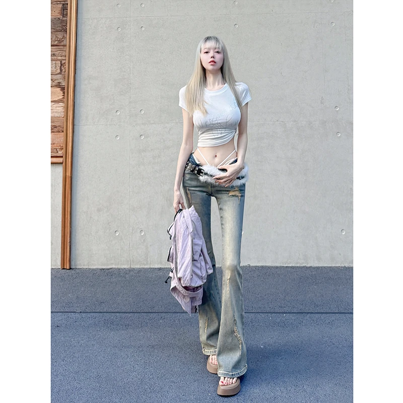破洞爱心铆钉刺绣低腰微喇叭牛仔裤女2025秋季新款设计感显瘦百搭