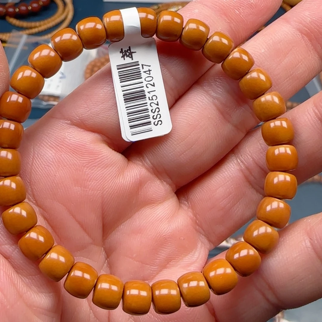 雪***聪手串橄榄核老挝SS级核尖极限弧尺寸7.4微变色