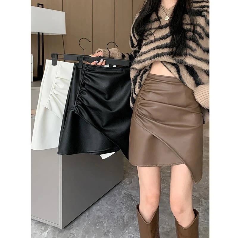 大尺码女装不规则黑色半身裙女秋季高腰a字皮裙胖MM遮肉显瘦裙子
