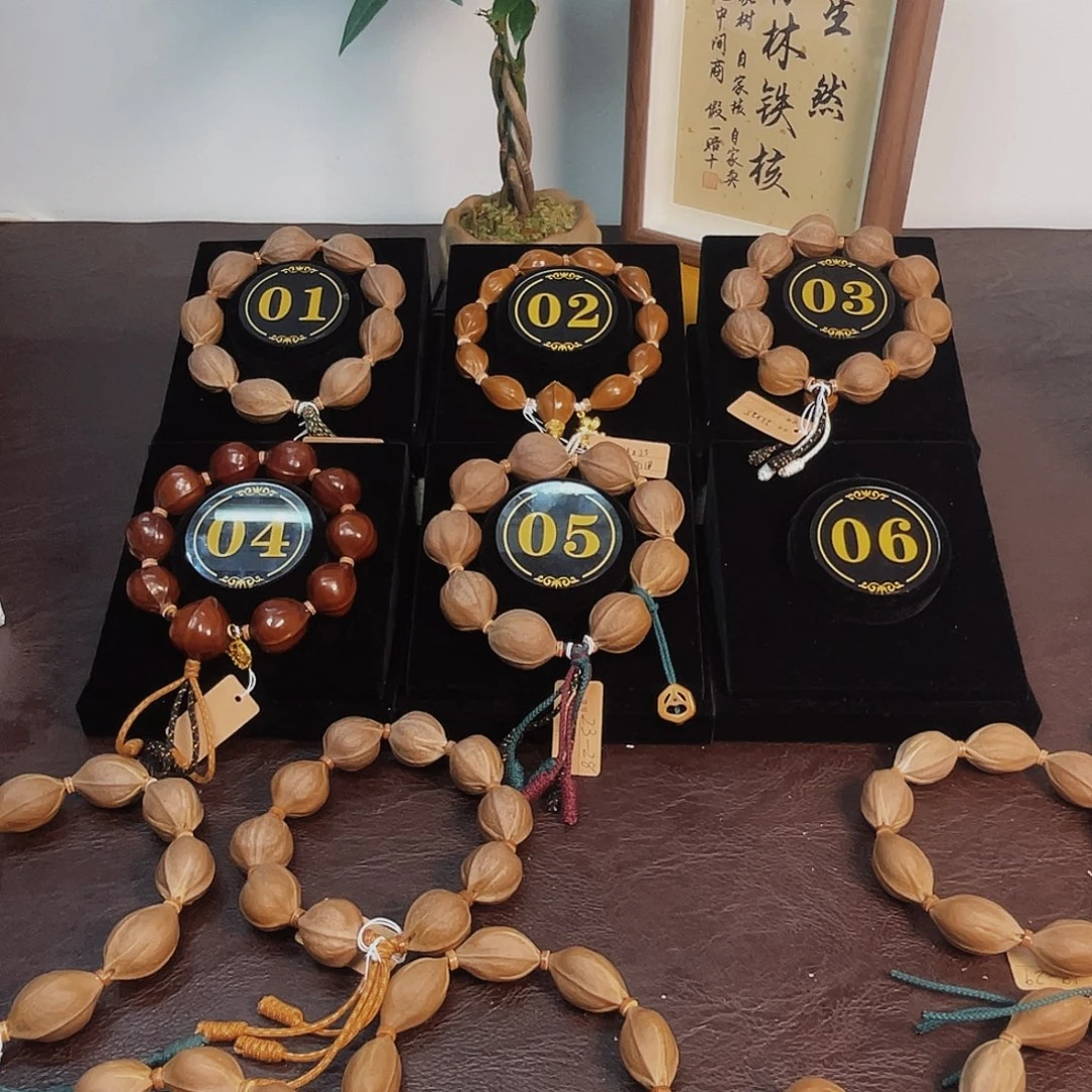 固***态橄榄核手串梅林铁核20*26