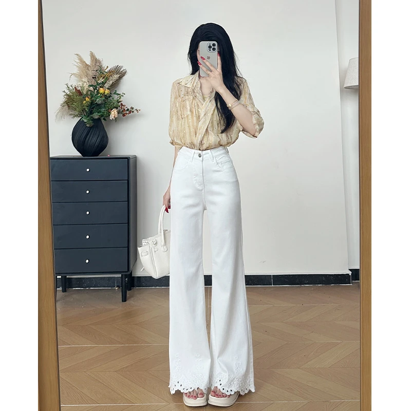 乔栈莱赛尔天丝白色镂空花边宽松喇叭牛仔裤女夏季凉感高腰微喇裤