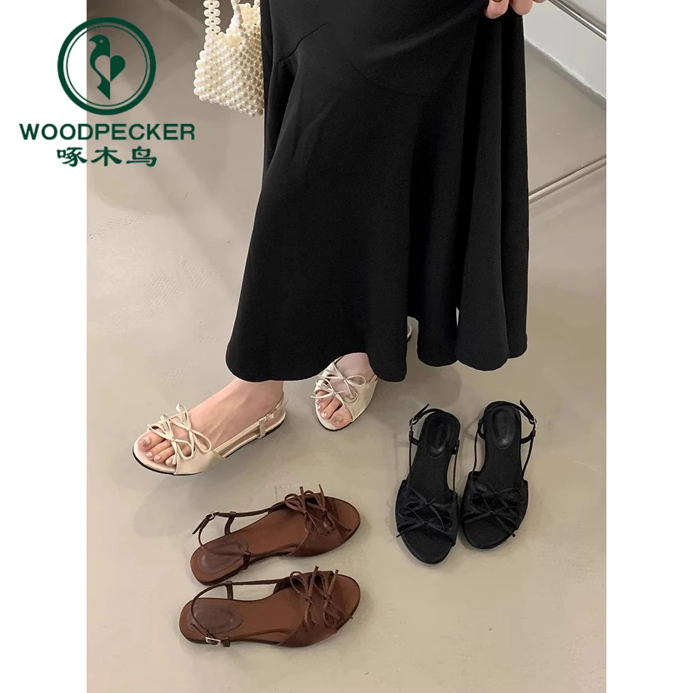 啄木鸟绝美平底凉鞋女夏外穿2025新款仙女蝴蝶结气质时尚罗马女鞋