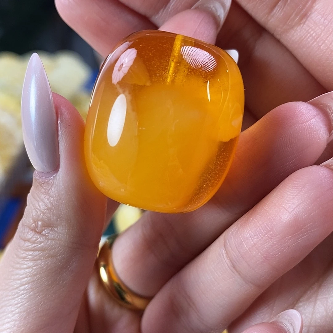 琥珀未镶嵌珠宝奇石15.29焦皮蜜糖色