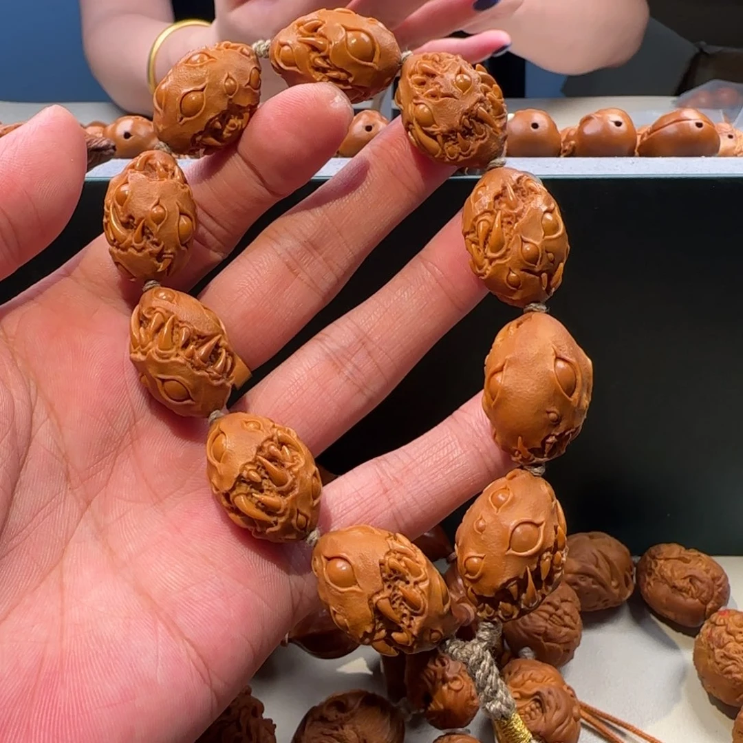 手串橄榄核千目吞噬