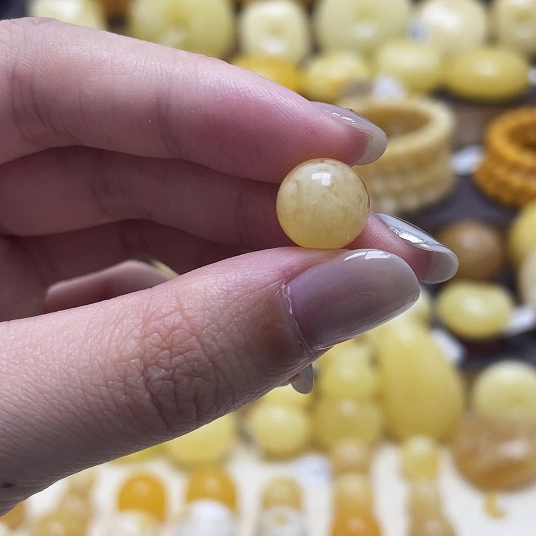 琥珀未镶嵌裸石10.6mm金白妖花圆珠瑕