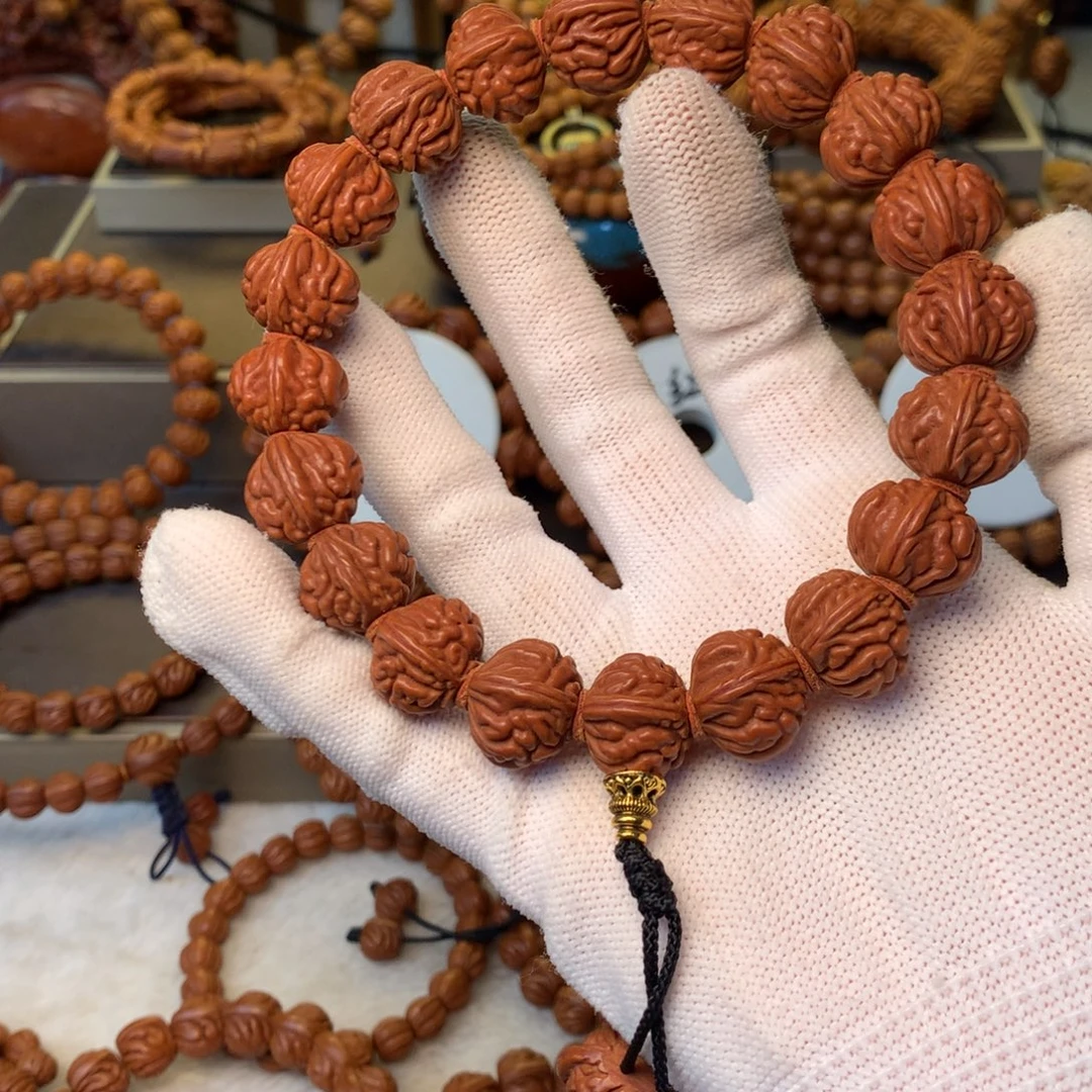 日***方桃核手串秦岭龙纹