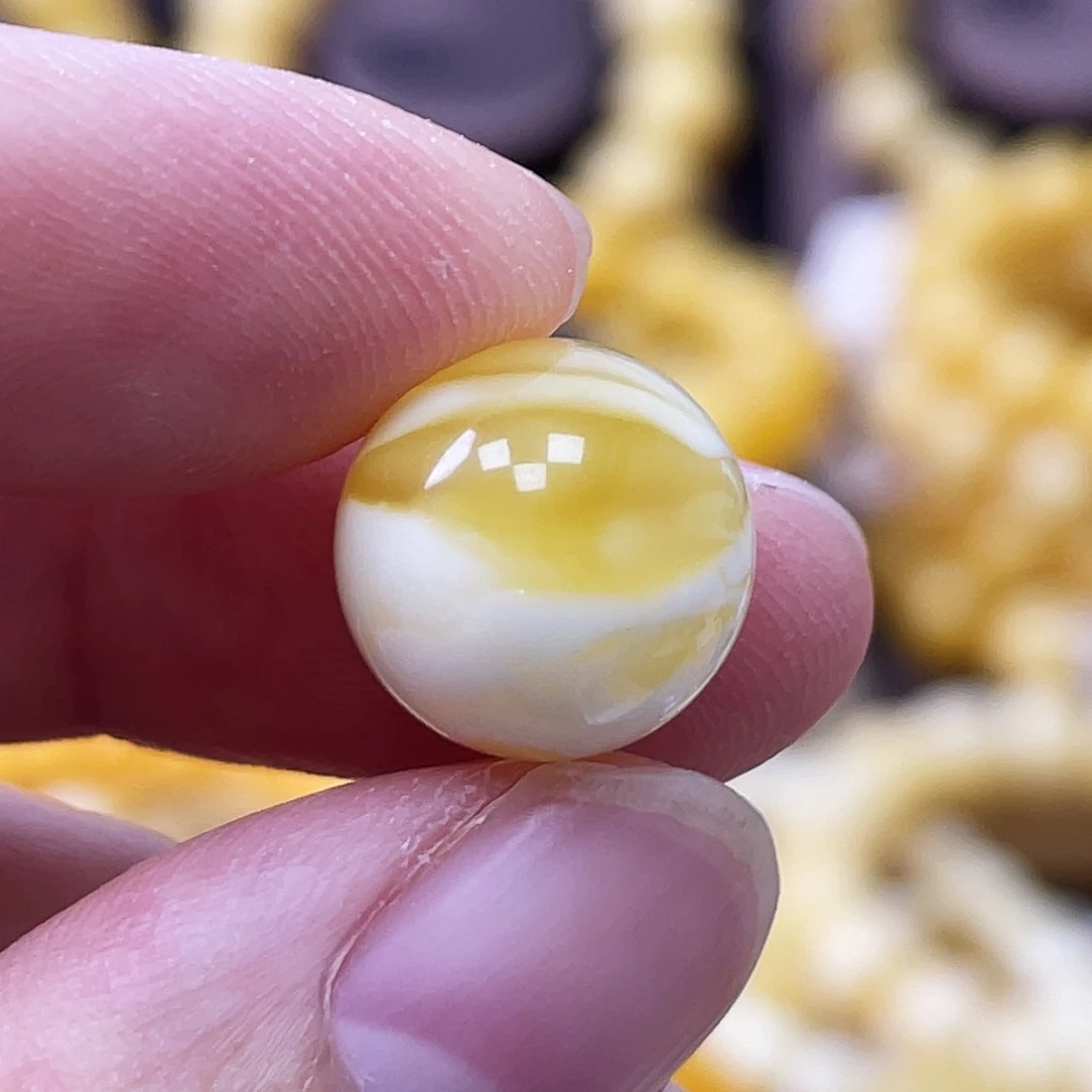 裸石琥珀未镶嵌12.2mm金瓷白溶洞妖花