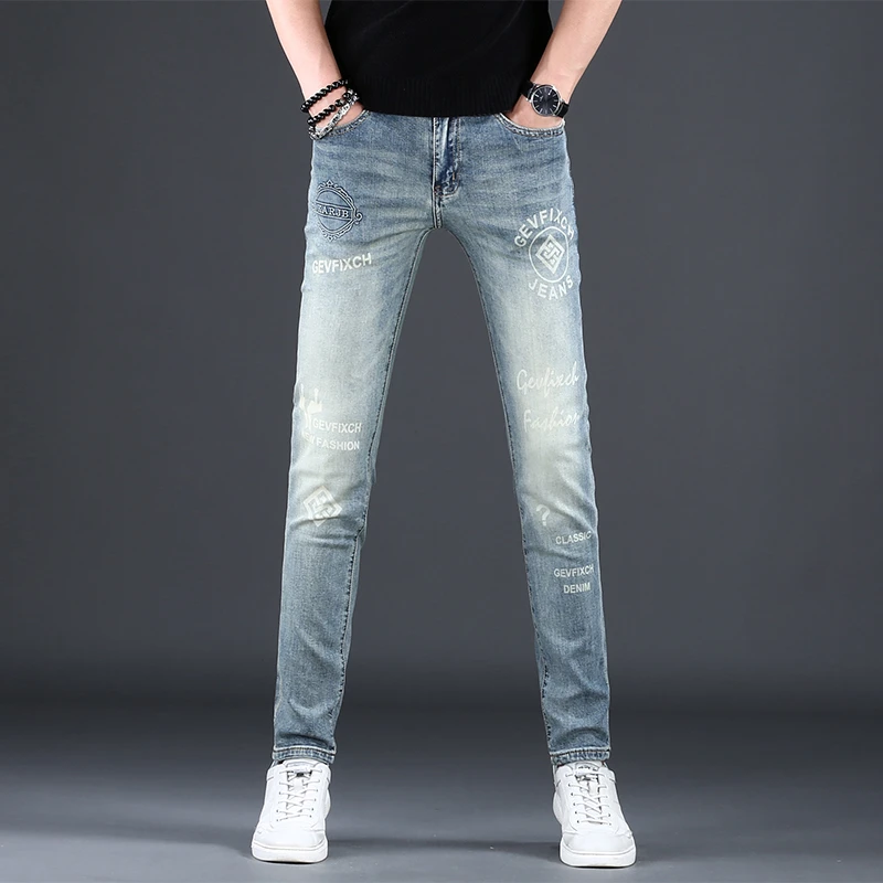 男士韩版印花牛仔裤男潮牌痞帅春秋新款弹力修身小脚潮流休闲长裤