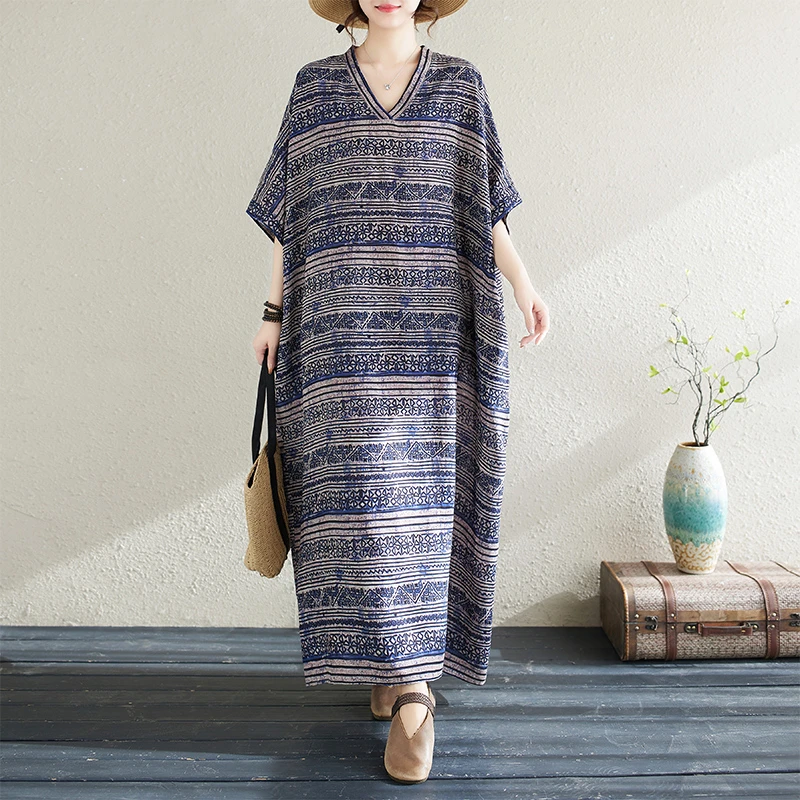 折扣夏季花色度假风旅游V领复古长裙遮肉棉麻连衣裙子加长款裙子