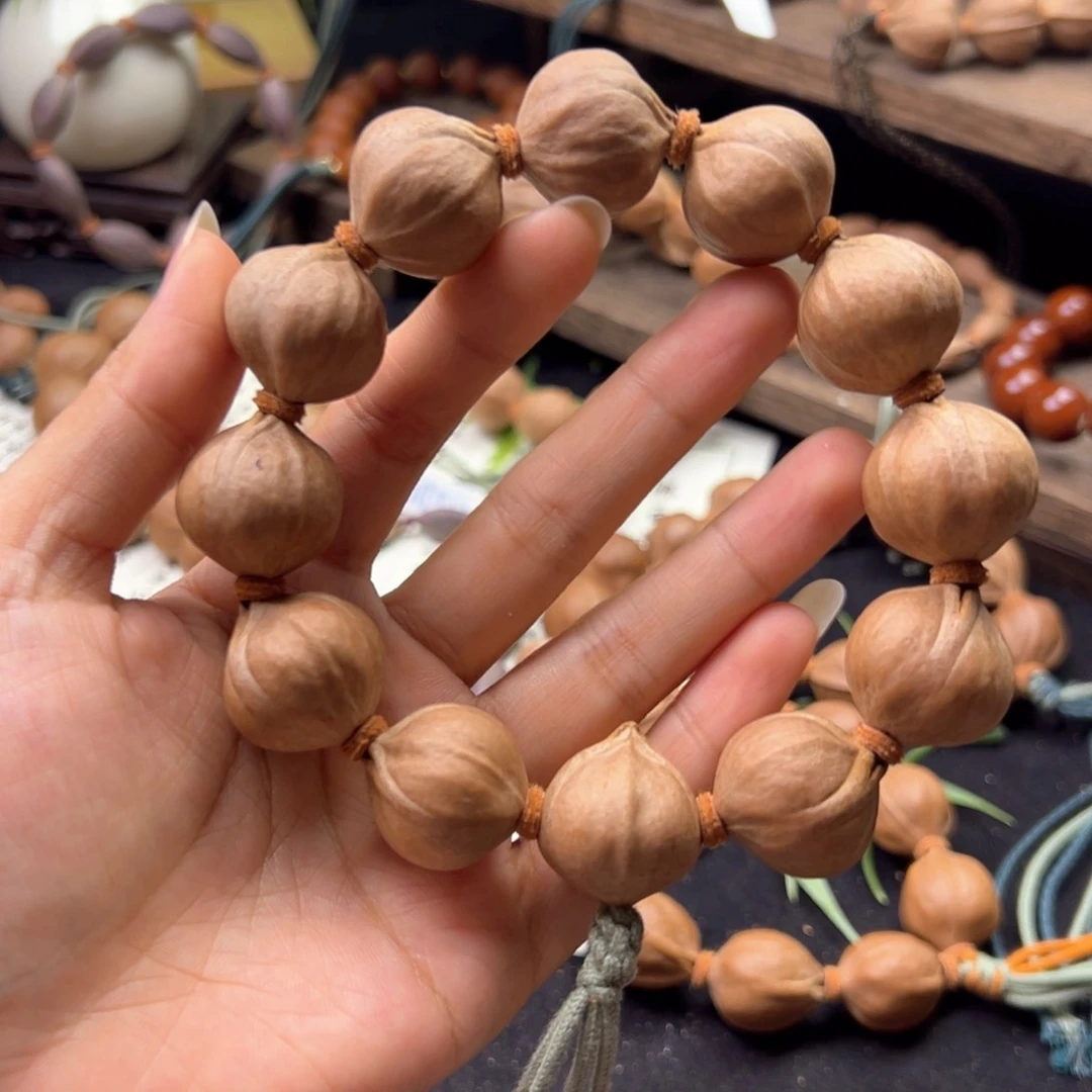 手串橄榄核顺**杨006。22×23