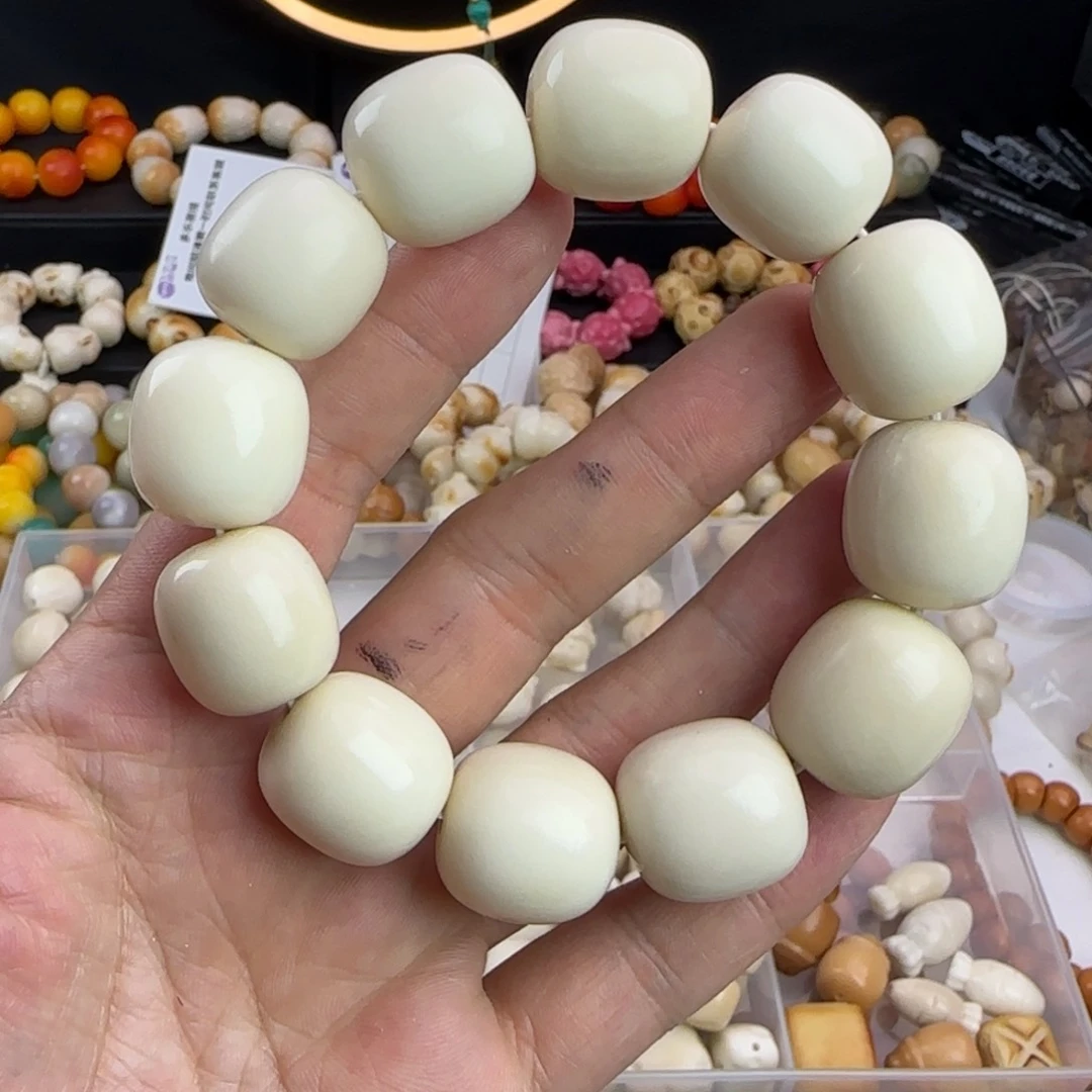 菩提根/象牙果吊坠瑕疵卡21桶珠手串一条