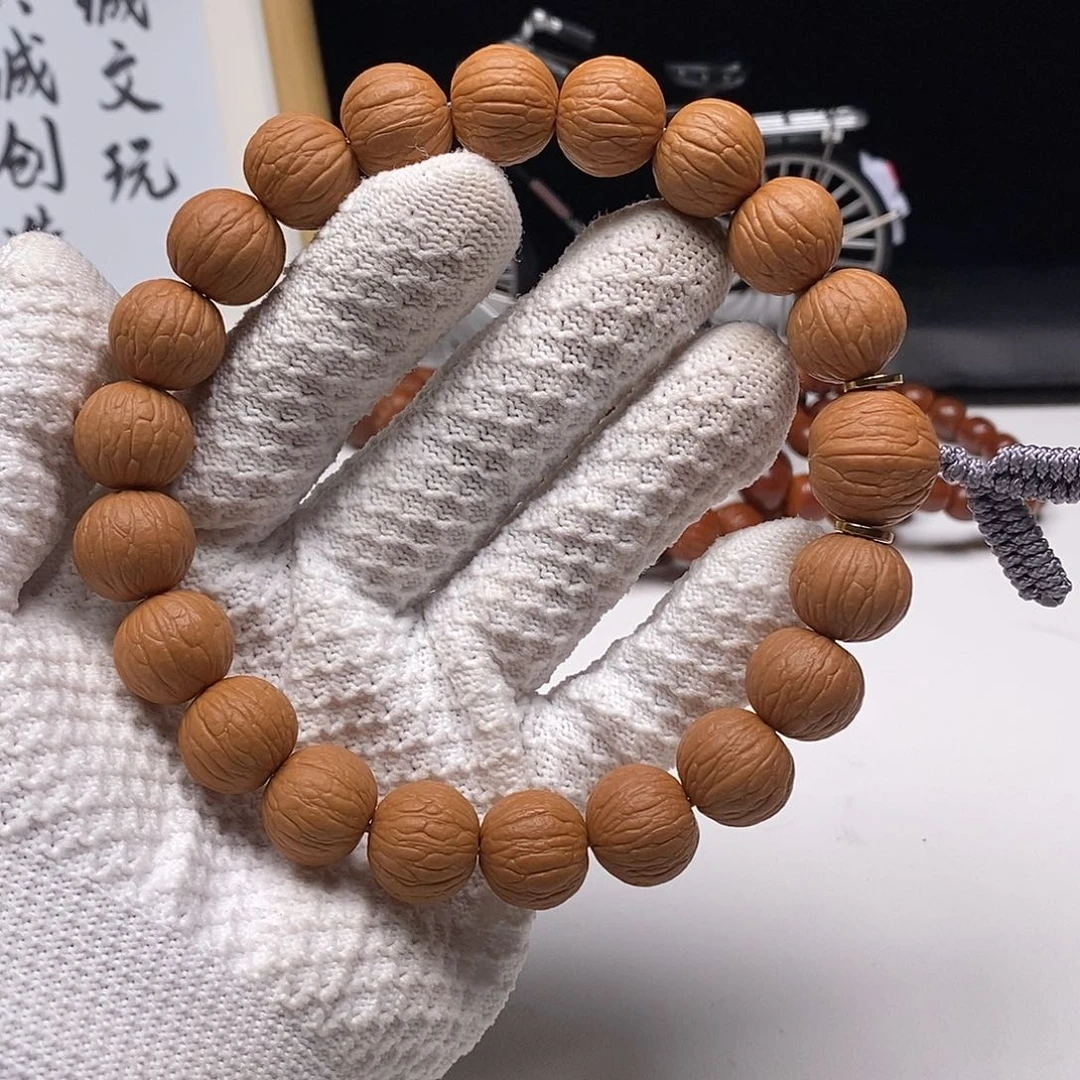 猴头核桃手串柿***_猴头核桃原皮聚宝盆手持