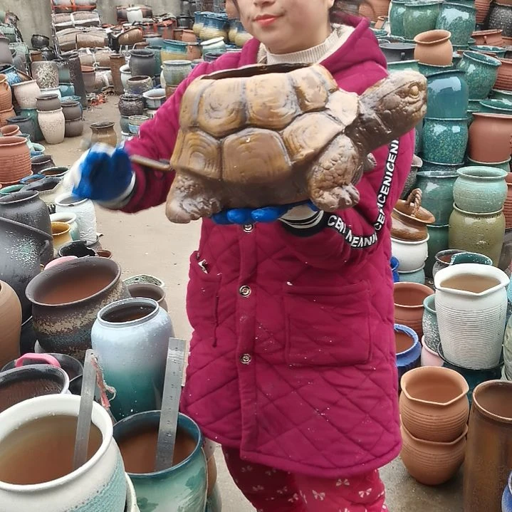 红陶招**宝瑕疵一个盆子。。。。