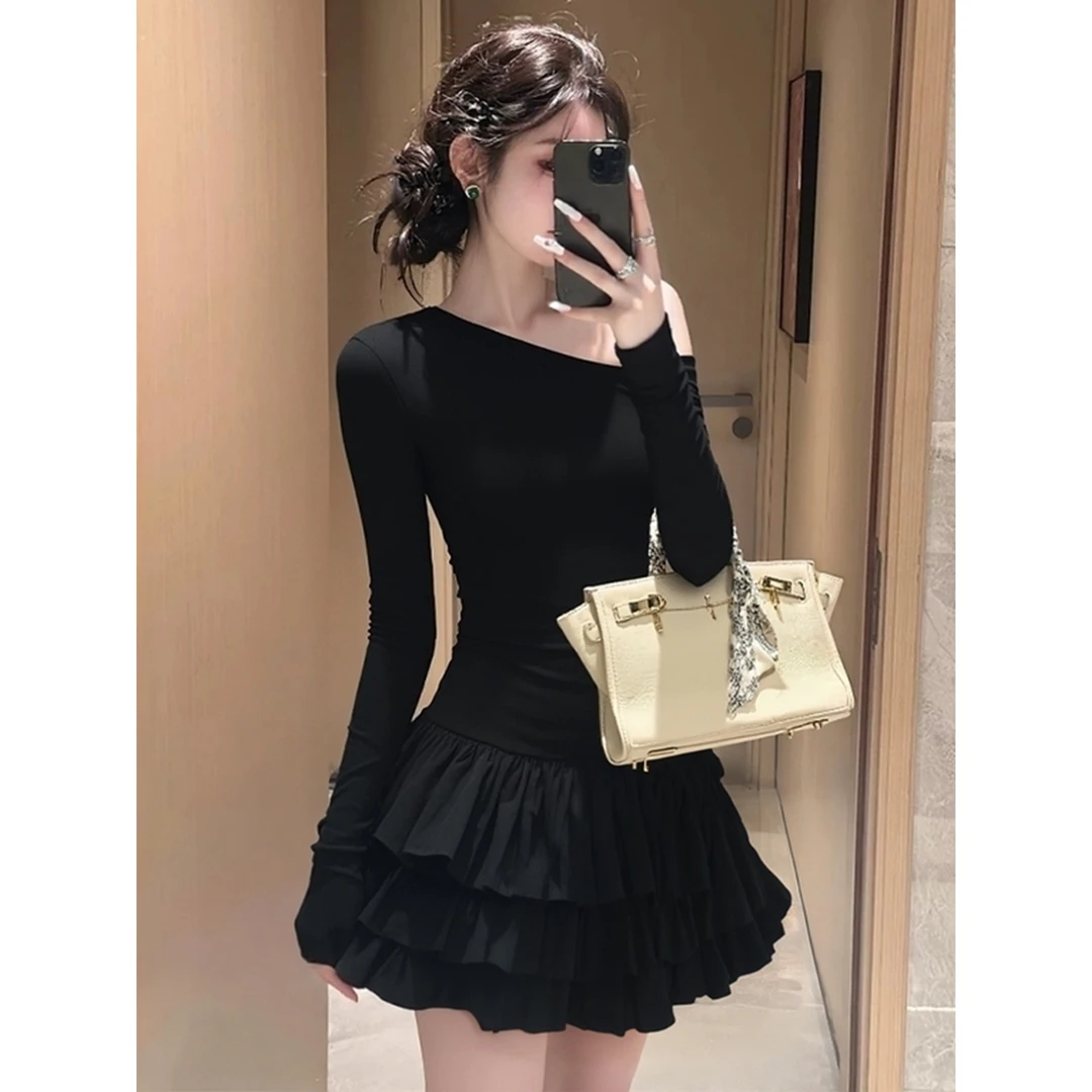 法式赫本风高级感修身气质黑色连衣裙秋冬新款设计感斜肩长袖裙子