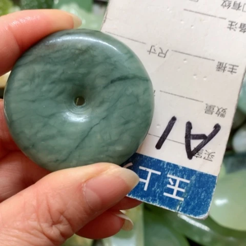 蛇纹石玉手把件未镶嵌