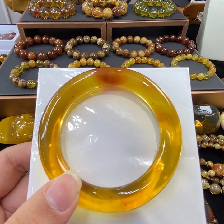 团***团琥珀未镶嵌手镯亮金棕圆条