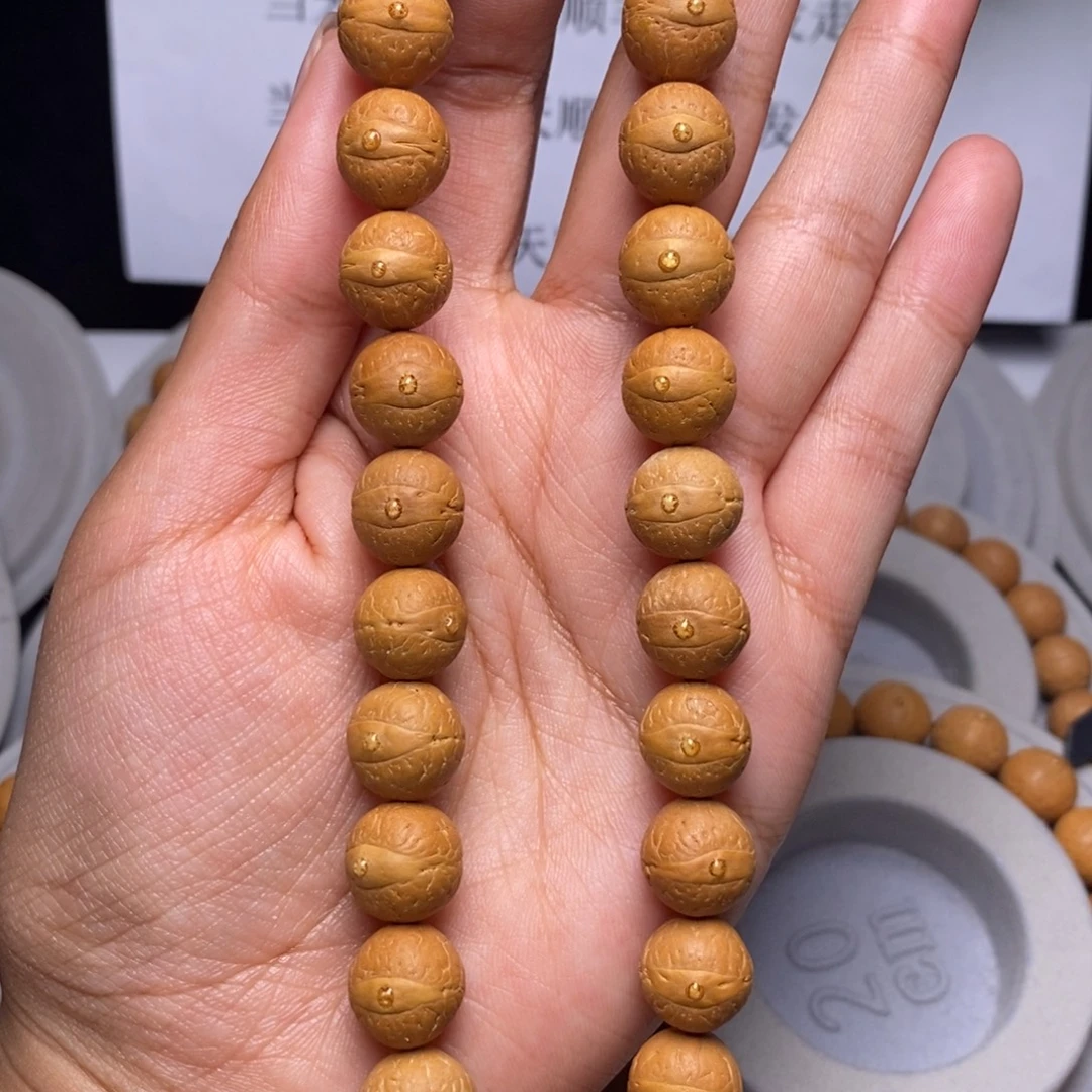 凤眼菩提吊坠手持