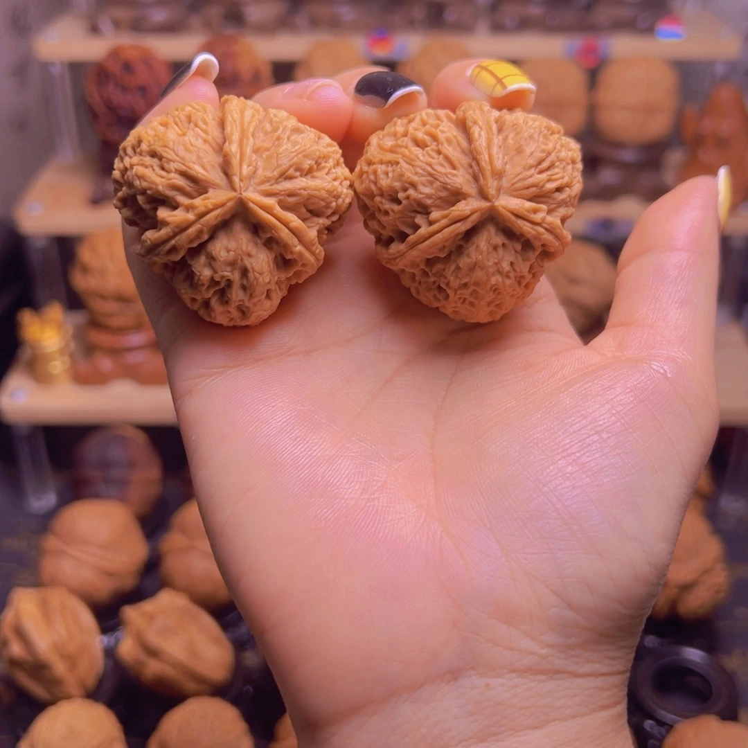 老***儿把件桃核密石三棱H08、40……