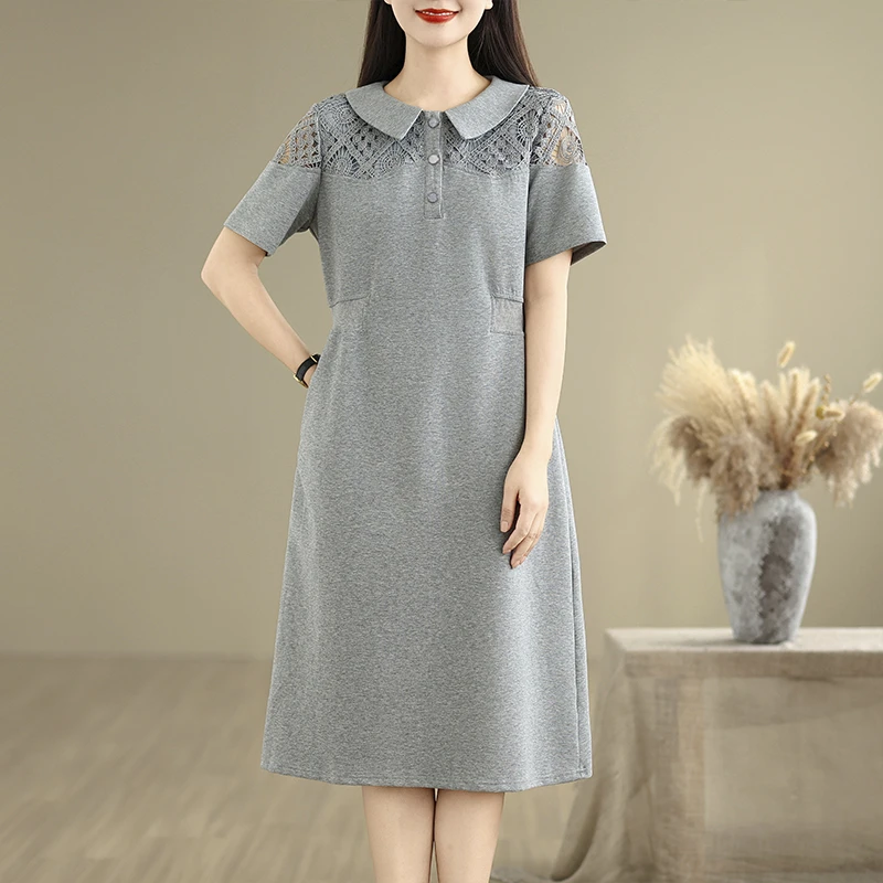 新款显瘦透气宽松短袖A字裙拼接蕾丝中长款气质减龄连衣裙