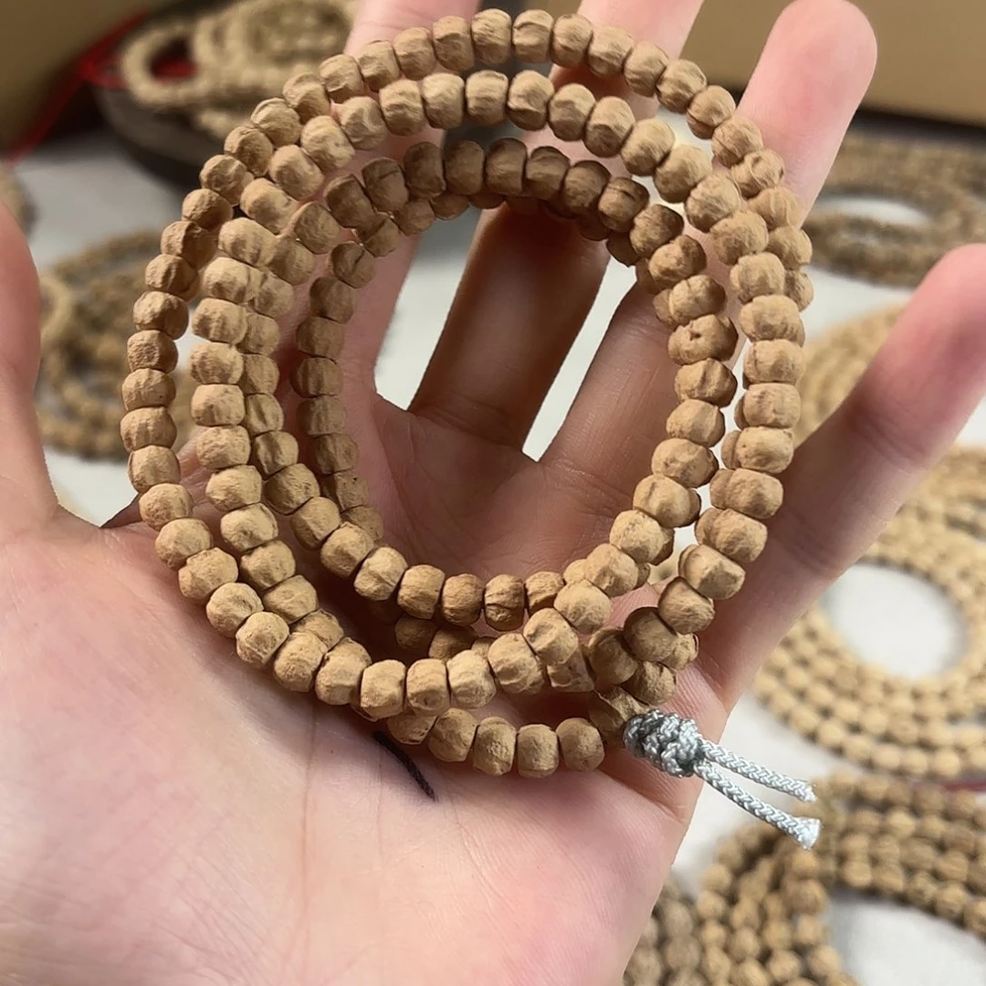 勤***问柏香籽/百香籽吊坠