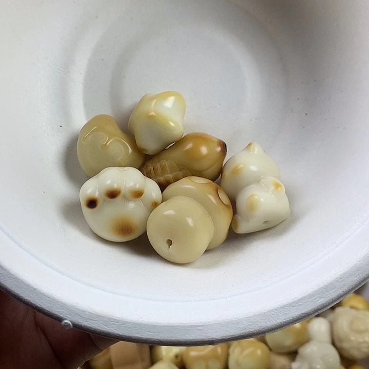 赵***y菩提根/象牙果吊坠象牙果瑕疵3大3小 不退不换