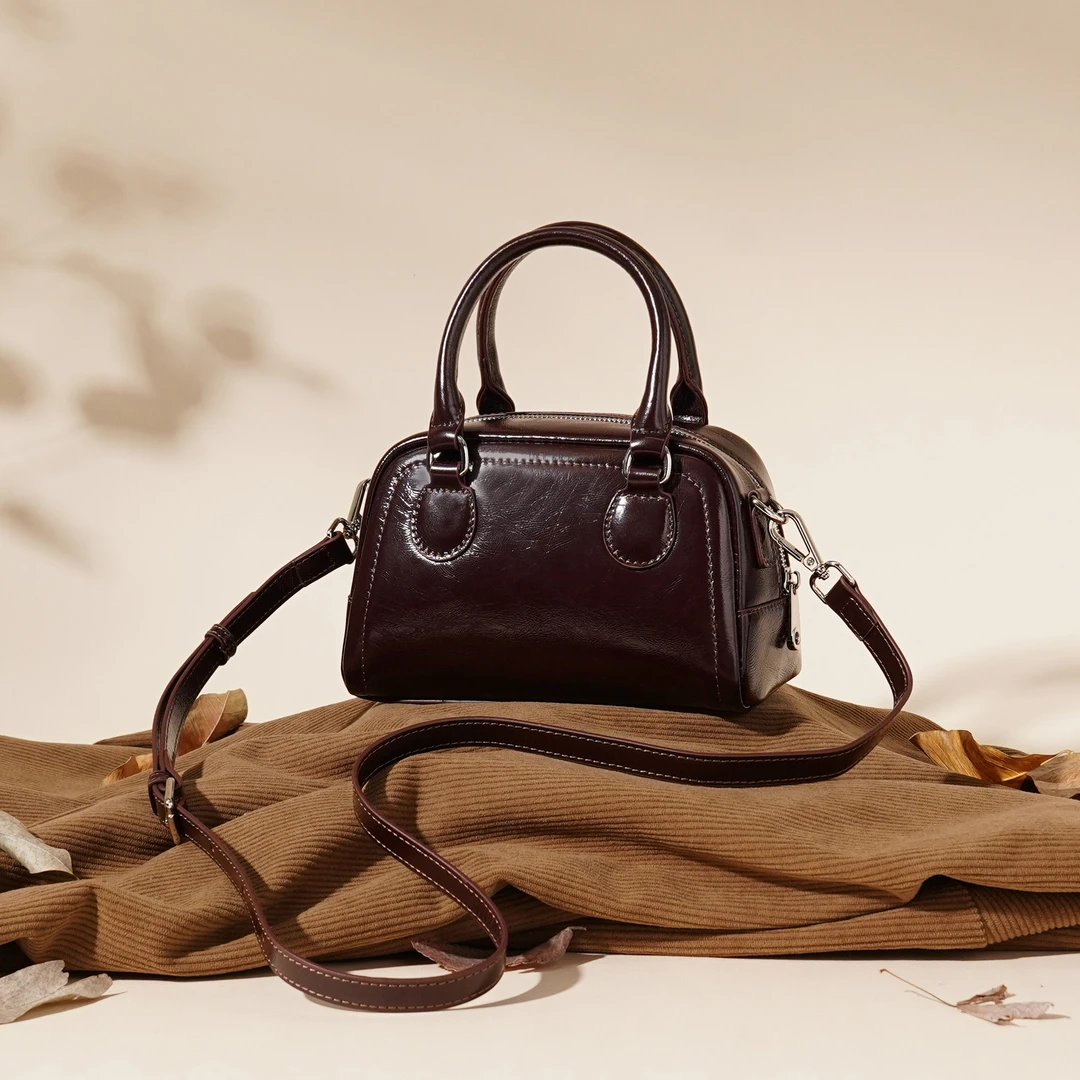 岩牛秋冬新款波士顿女士百搭肩包休闲时尚保龄球包YN3524