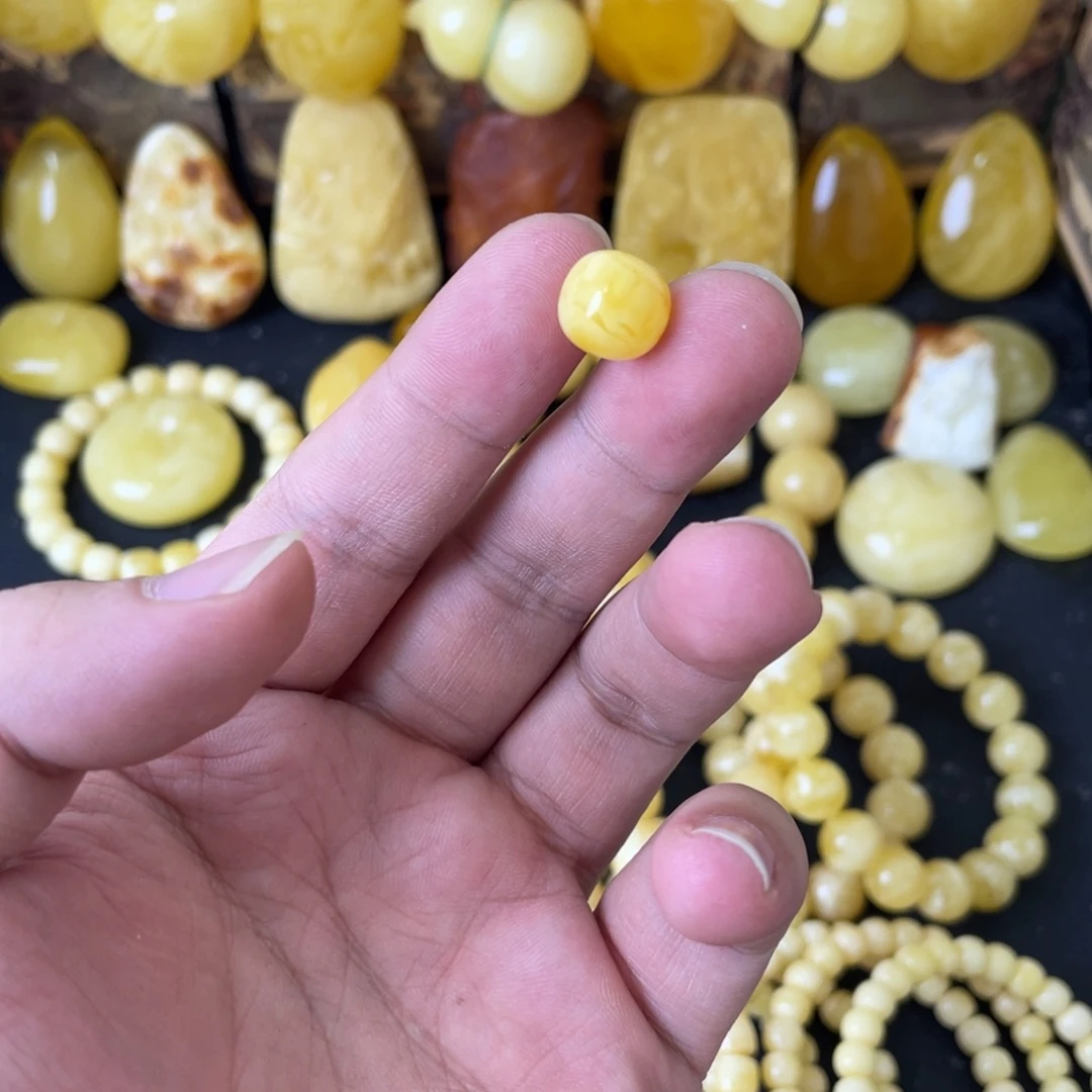 晨***爩琥珀未镶嵌裸石10+俄料黄白花老型单珠