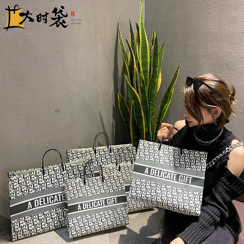 手提袋可折叠免税店袋pvc手提袋服装袋大容量大气包装时尚创意
