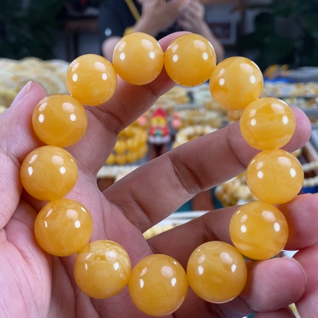 琥珀未镶嵌珠宝奇石17鸡油红手串40.35