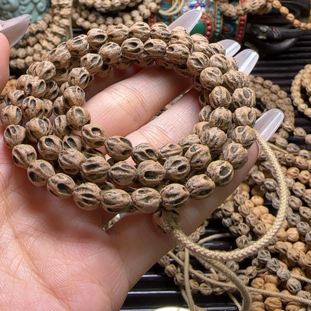 ****压柏香籽/百香籽吊坠