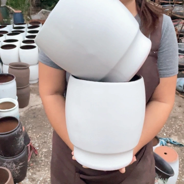 紫砂花盆口19高24瑕疵瑕疵大底裂