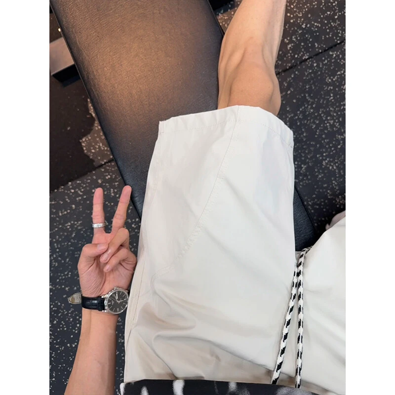 美式斜切休闲短裤男款夏季潮牌拼接宽松薄款速干篮球运动四分裤子