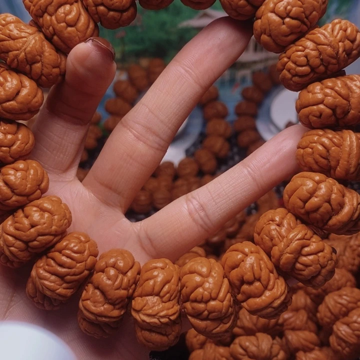 林***狼文玩核桃吊坠龙纹桃核手串