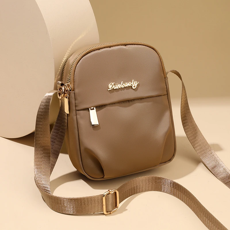 新款单肩包户外旅行韩版潮流斜挎包男女手机零钱钥匙小包女款