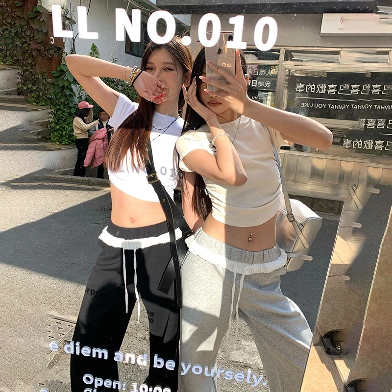 25年新款 花边撞色拼接设计松紧腰垂感运动微宽松喇叭休闲卫裤女