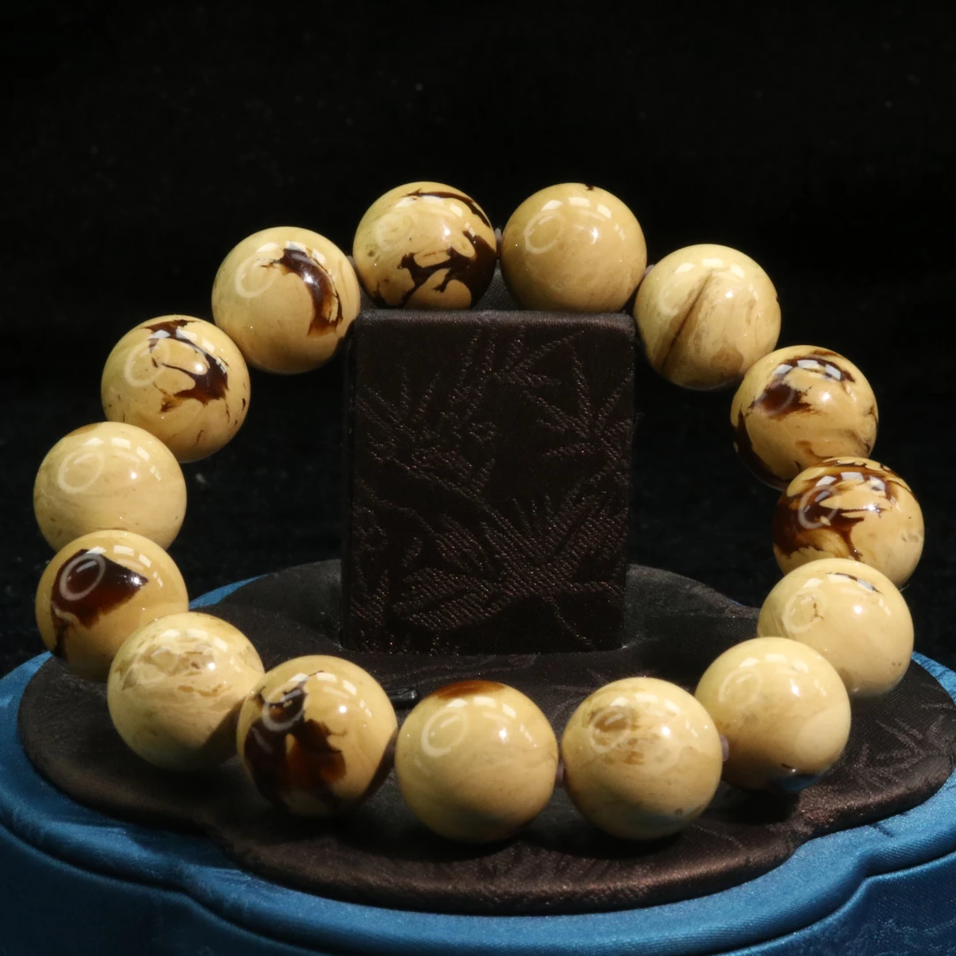 32琥珀溶洞蜜手串/800397上海嘉禾拍卖